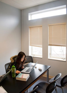 Photo: Student using library study room, which was upgraded with funds from the UMCOE Foundation.