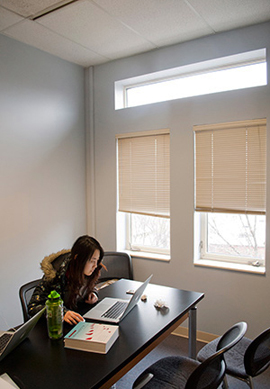 Image of student using new study room, which was upgraded with funds from the UMCOE Foundation.